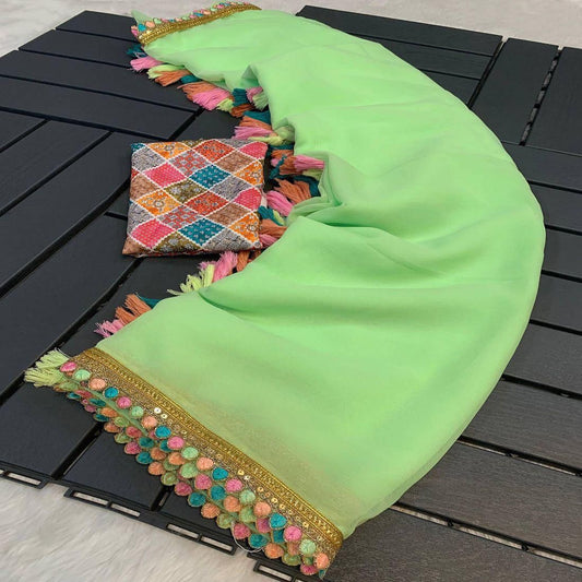 Karinaaz Peach Georgette Bridal Saree